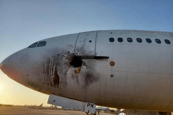 حمله به فرودگاه بغداد/ برخورد راکت با هواپیما