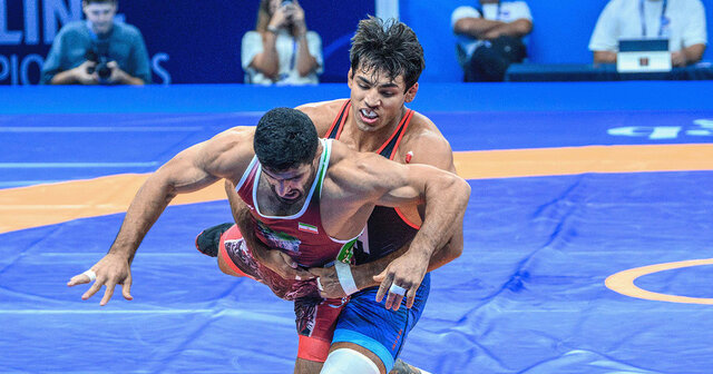  اولین واکنش کشتی‌گیر آمریکایی بعد از توهین به کامران قاسم‌پور