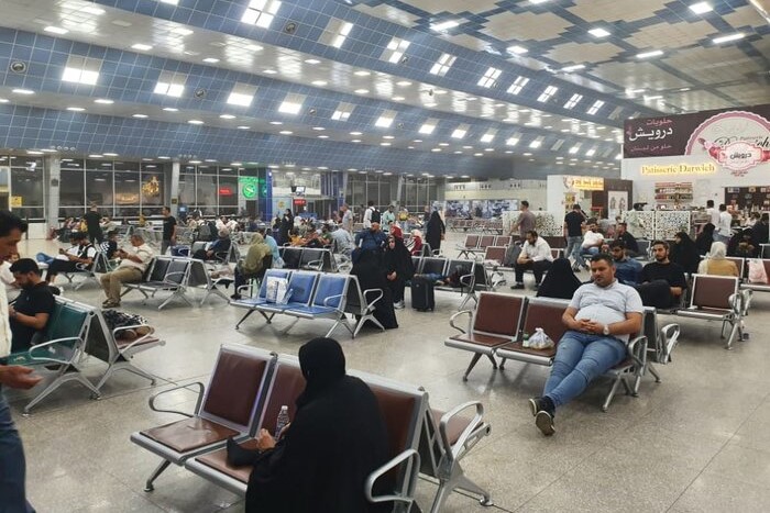 سرگردانی ۱۳ ساعته مسافران ایرانی بعد از لغو پروازها در نجف+فیلم